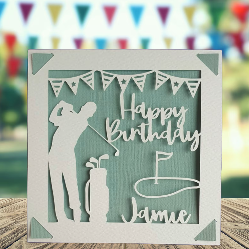 A personalised golfing birthday card for someone who loves golf. The card is fully customisable with the recipient's name. The card features a figure playing golf, with their golf club, bag and a cut out of a golf hole with flag. The background colour is teal.