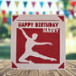A red birthday card with a silhouette of a person dancing, and the text "Happy Birthday Harry" written on it.