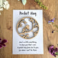Small wooden pocket hug with a robin design and accompanying comfort message